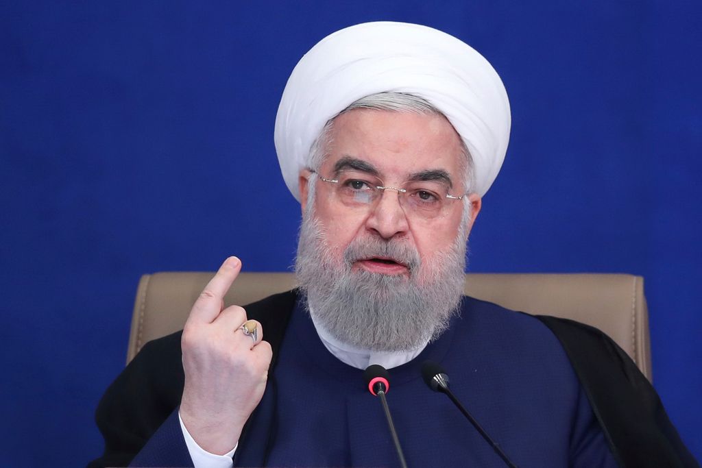 Hassan Ruhani mit erhobenem Zeigefinger.